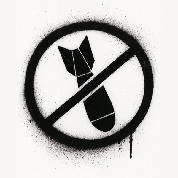 Stencil showing a black bomb crossed out in a circle, symbol of protest or pacifism, created in a graffiti style with paint splatter effects.