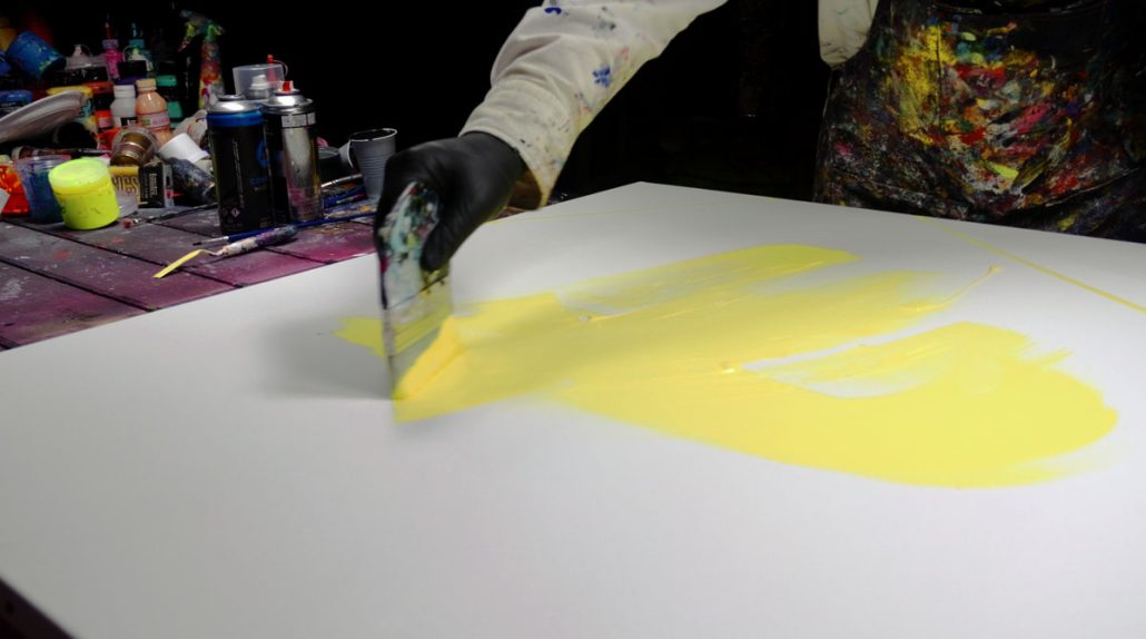 Applying a pale yellow acrylic base to begin the Pixel Geisha artwork