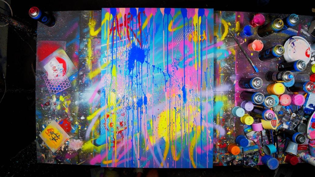 Colorful street art background with splashes and graffiti for the artwork Art is My Revolt with Van Gogh Punk stencil)