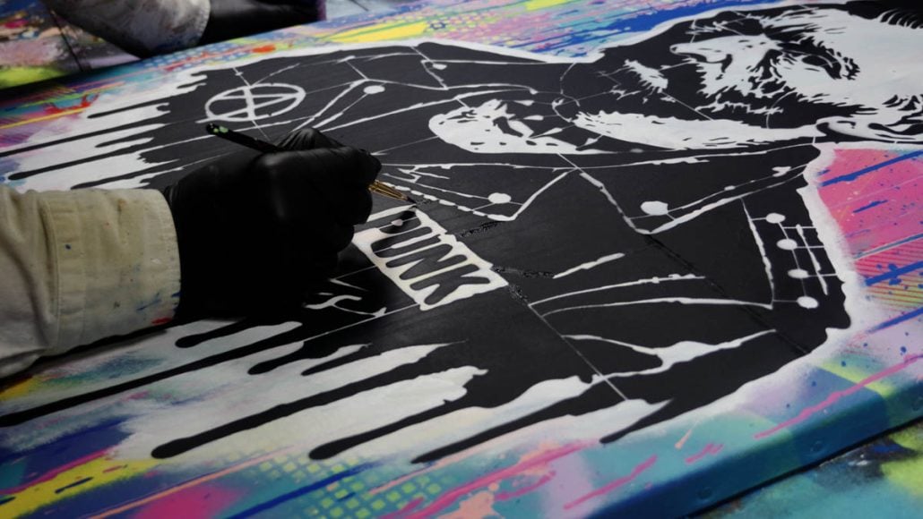 Correcting the Van Gogh Punk stencil bridges with a brush and black paint