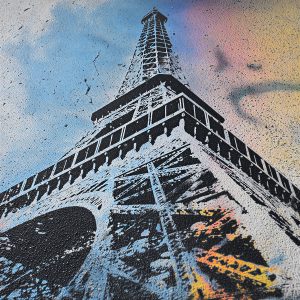 Artistic result using a stencil of the Eiffel Tower with a colorful background