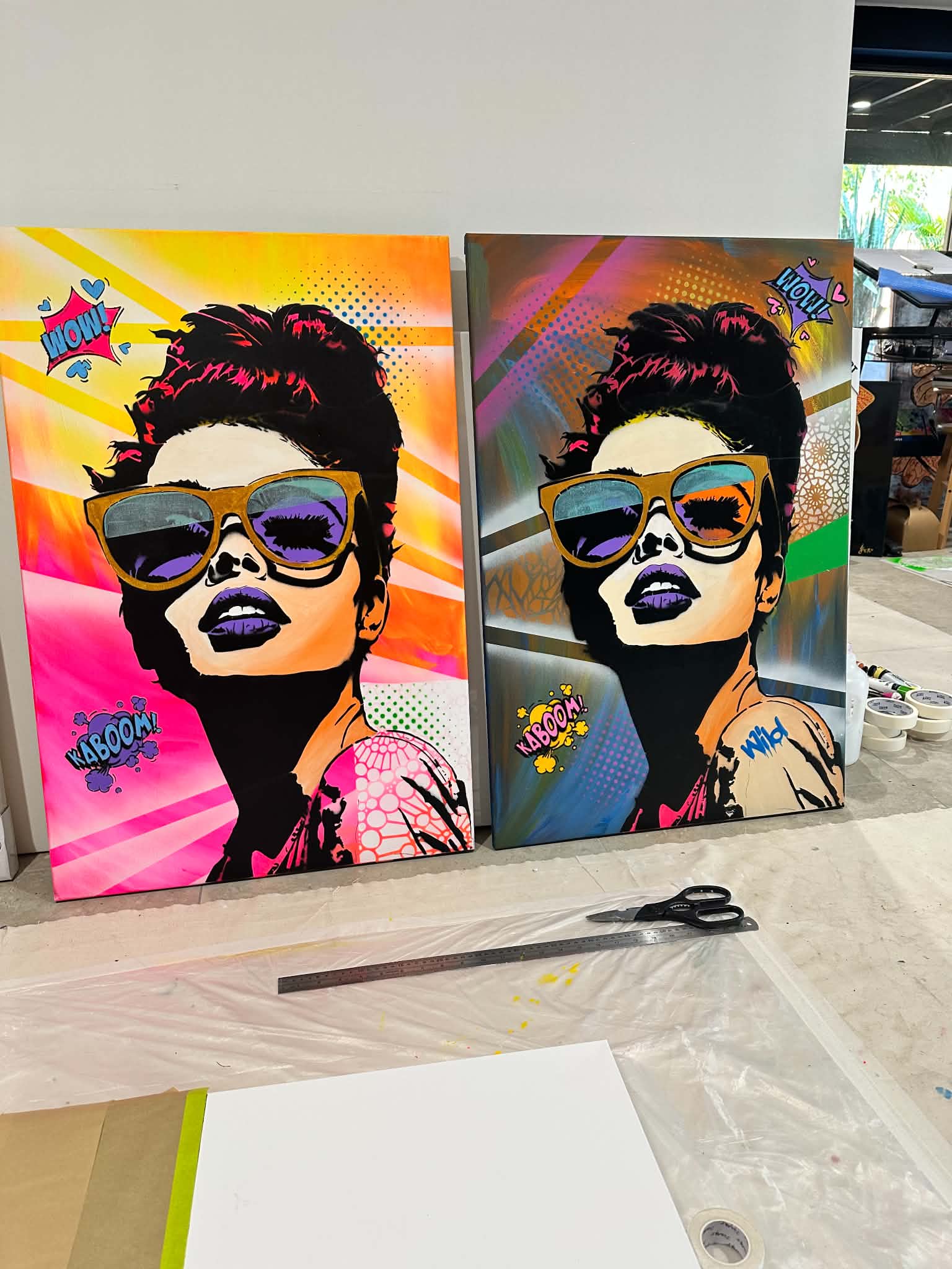 Review - Canvas artworks created by a customer using our Woman with Glasses & Bun Portrait stencil.